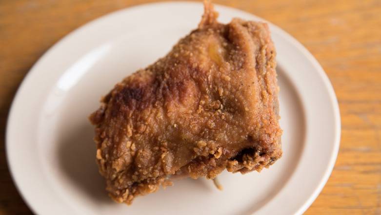 Order One Thigh food online from Roscoe House Of Chicken & Waffles store, Long Beach on bringmethat.com