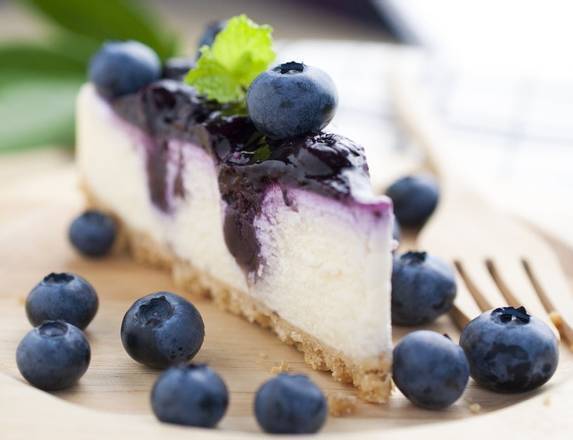 Order X-Large Blueberry Cheesecake Slice with Whip Cream food online from Valbella Midtown store, New York on bringmethat.com