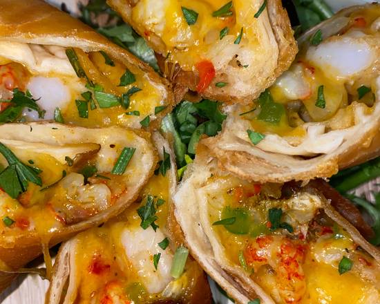 Order St. Claude Seafood Rolls food online from Nola Super Kitchen store, New Orleans on bringmethat.com
