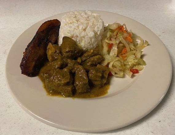 Order Curry Goat food online from Valencia Caribbean Restaurant store, Margate on bringmethat.com