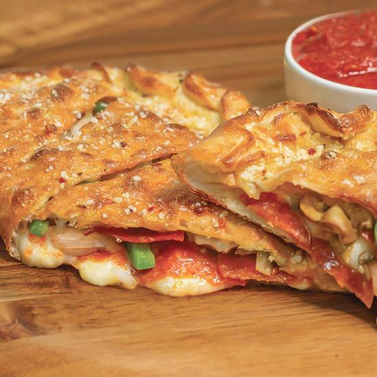 Order Deluxe Calzone food online from Marcos Pizza store, Aurora on bringmethat.com