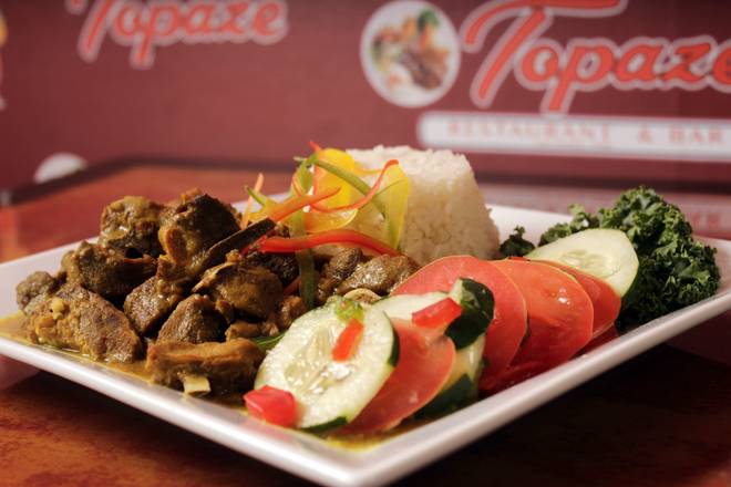 Order Curry Goat Meal food online from Topaze Restaurant 1 store, New York on bringmethat.com