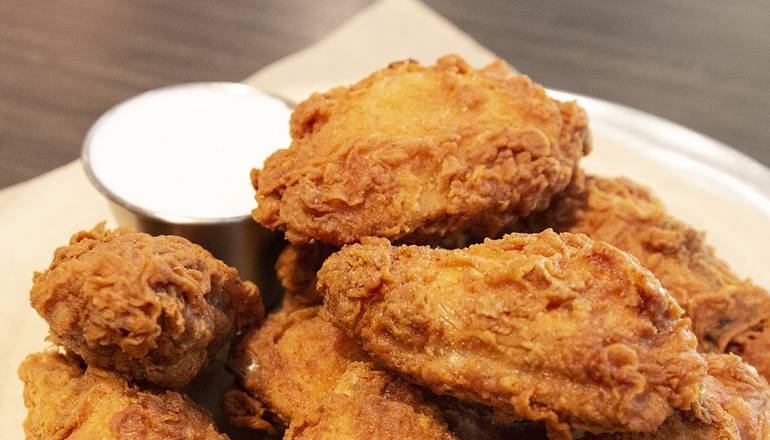 Order 16 Crunch Wings food online from Wing Zone store, Jacksonville on bringmethat.com