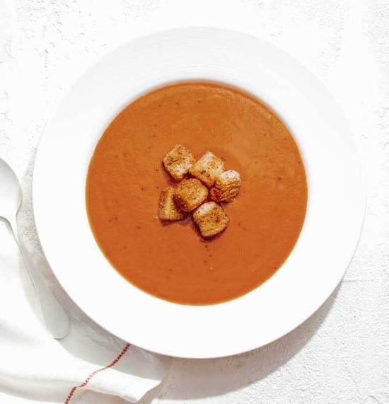 Order TOMATO BASIL BISQUE food online from California Pizza Kitchen store, Kapolei on bringmethat.com