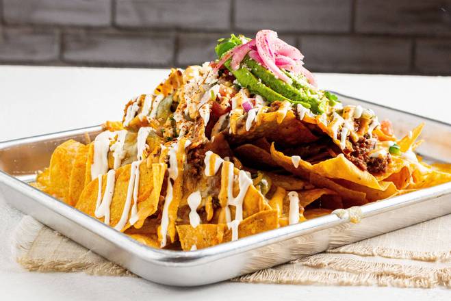 Order Nachos Gordos food online from Frida’s store, Ormond Beach on bringmethat.com