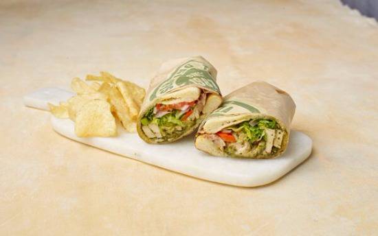 Order Pesto Chicken food online from Flippers Pizzeria store, Orlando on bringmethat.com
