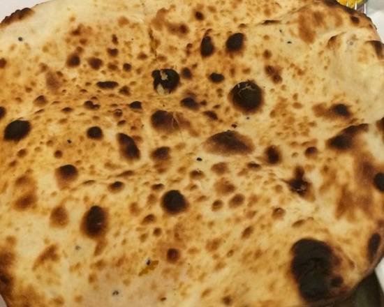 Order Peshwari Naan food online from Tandoorish Indian Cuisine Restaurant store, Houston on bringmethat.com