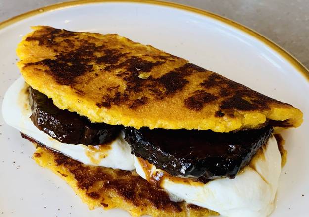 Order Cachapa with Black Pot Roast and Cheese food online from Chicken Grill store, Miami on bringmethat.com