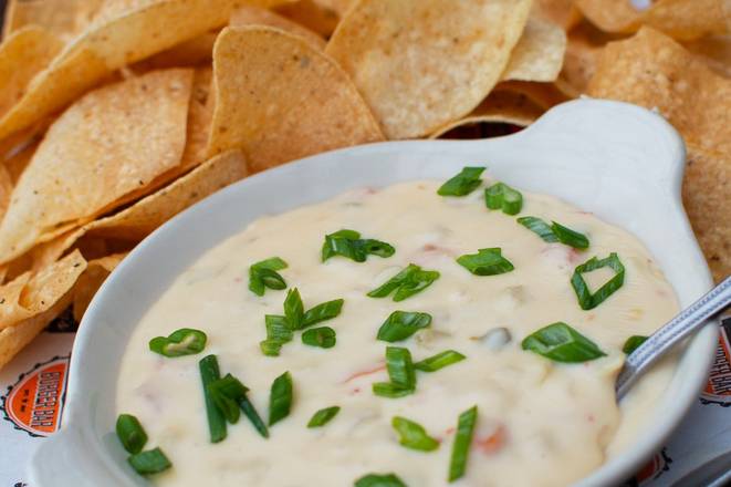 Order Bad Daddy's Amber Ale Queso & Chips food online from #204 Bad Daddy Burger Bar store, Greenwood Village on bringmethat.com