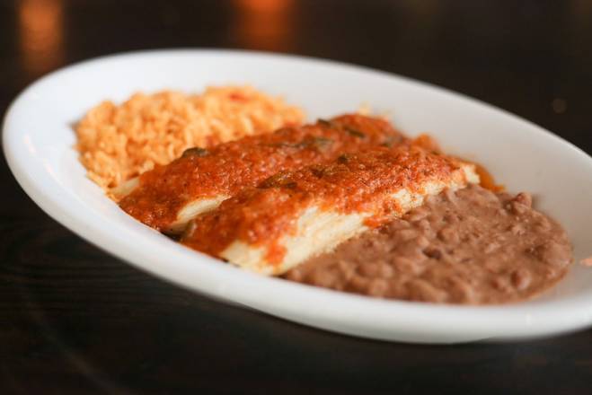 Order Chicken Tamales food online from Cocina 214 store, Winter Park on bringmethat.com