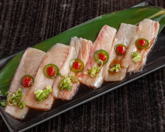 Order Yellowtail Jalapeno Appetizer  food online from Poseidon Oyster Sushi Bar store, New Orleans on bringmethat.com