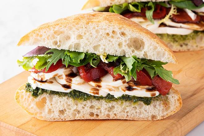 Order 1/2 Vegetarian Pesto Caprese Sandwich food online from Mendocino Farms store, San Ramon on bringmethat.com