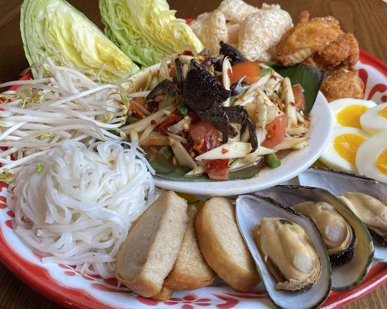 Order Som Tum Tart* (ตำถาด) food online from Charm Thai Restaurant store, Silver Spring on bringmethat.com
