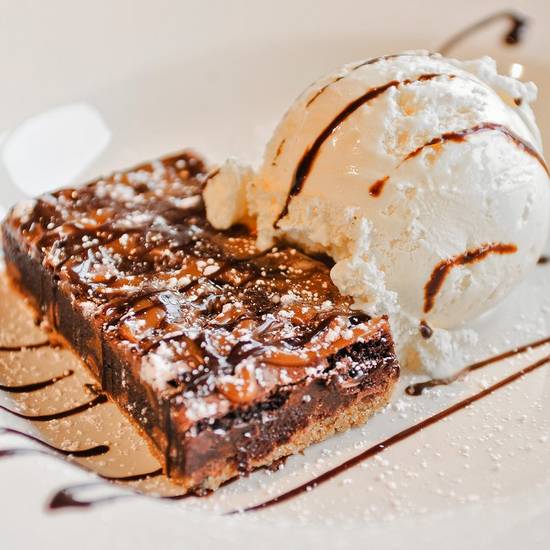 Order SALTED CARAMEL & CHOCOLATE BROWNIE food online from 54th Street Grill and Bar store, Saint Joseph on bringmethat.com