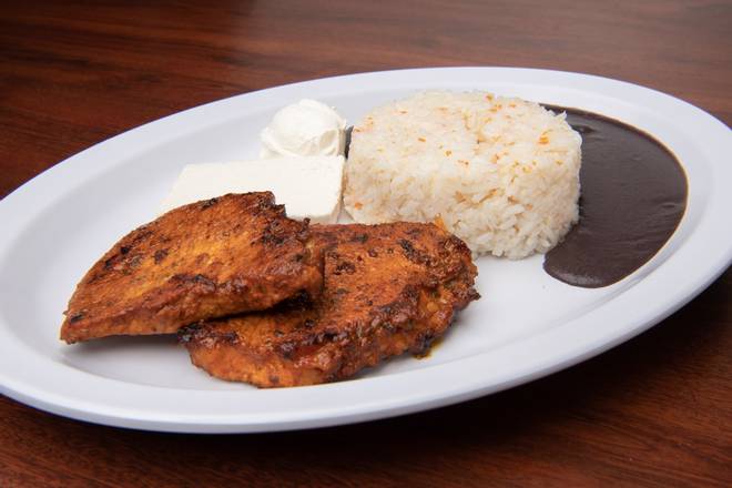 Order Puerco Adobado food online from El Tipico Quetzal Cafeteria store, West Palm Beach on bringmethat.com