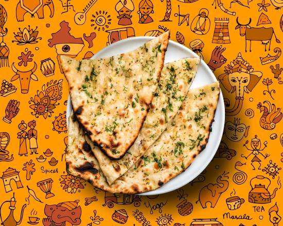 Order Garlic Garlic Naan food online from Gunpowder Cafe store, Chicago on bringmethat.com
