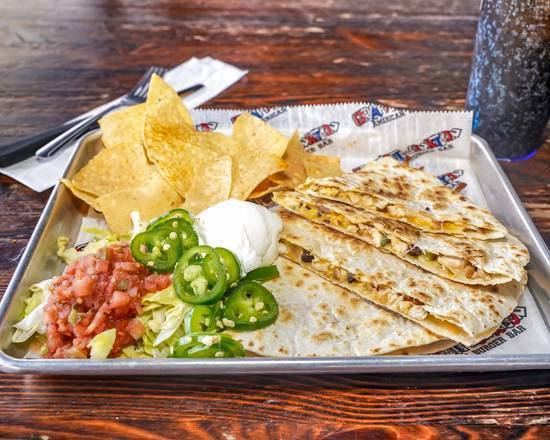 Order Chicken Quesadillas food online from Graffiti Junktion Llc store, Orlando on bringmethat.com