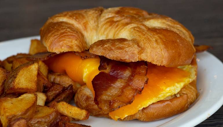 Order Bacon, Egg & Cheese Croissant* food online from Metro Diner store, The Villages on bringmethat.com