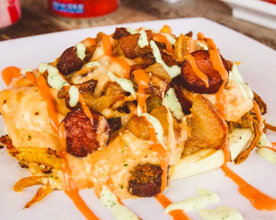 Order Choripapas food online from Caliburger Tampa store, Tampa on bringmethat.com