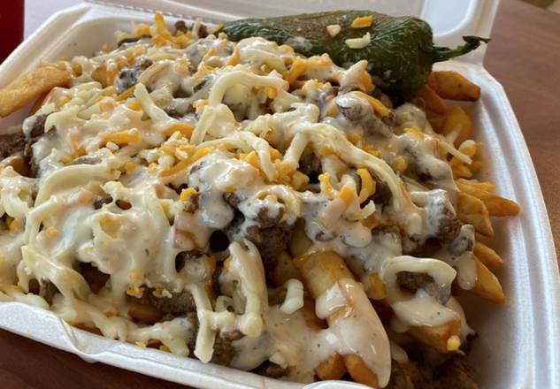 Order Carne Asada Fries food online from Norm's Famous Charbroiled Hamburgers store, Whittier on bringmethat.com