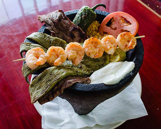 Order Molcajete food online from El Guerrero Mexican Grill store, Pinellas Park on bringmethat.com