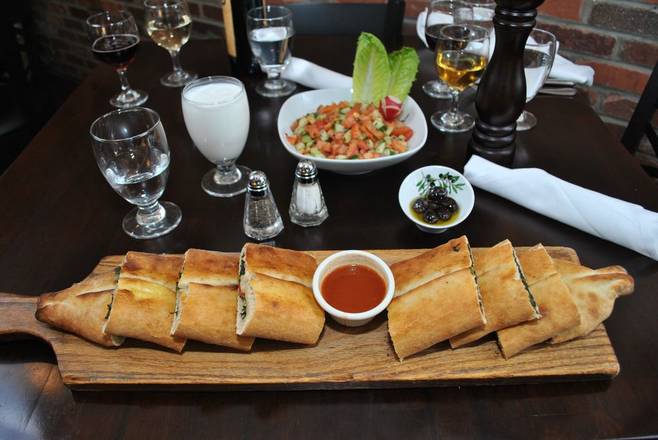 Order Spinach Pide food online from Europe Cafe & Grill store, Tenafly on bringmethat.com