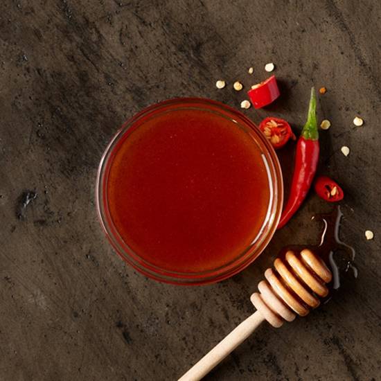 Order Sriracha Honey food online from Wings Out store, Euless on bringmethat.com