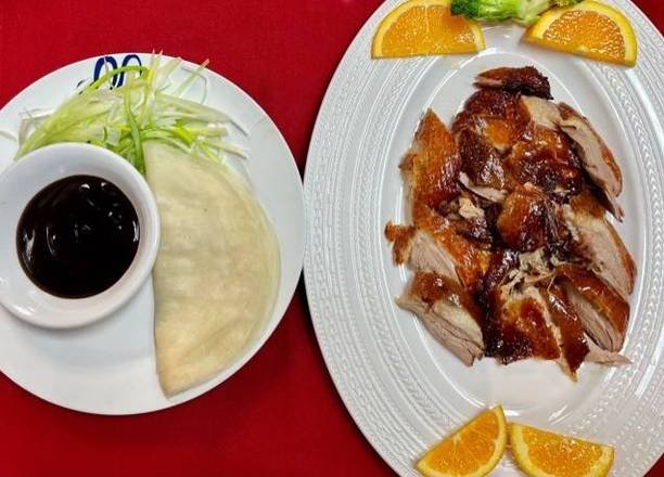Order 60. Boneless Charcoal Roasted Peking Duck (Half) food online from Mulan Asian Bistro East store, Memphis on bringmethat.com