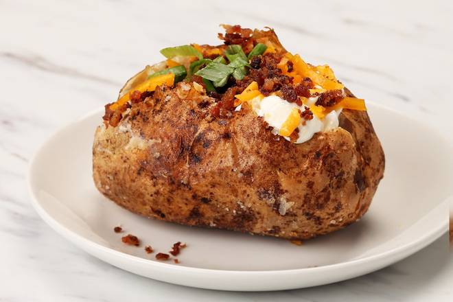Order Loaded Baked Potato  food online from Firebirds Wood Fired Grill store, Greenville on bringmethat.com