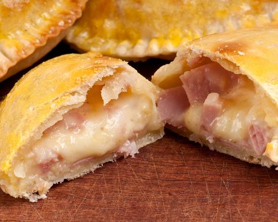 Order Empanada de Jamon y Queso  food online from Churro Magico store, Hialeah on bringmethat.com