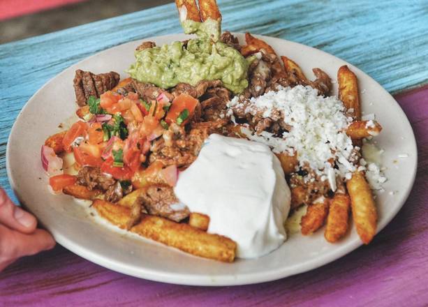 Order Carne Asada Fries food online from Taco Libre store, Jacksonville on bringmethat.com