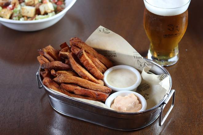 Order Hand-Cut Sweet Potato Fries food online from Iron Hill Brewery & Restaurant store, Greenville on bringmethat.com