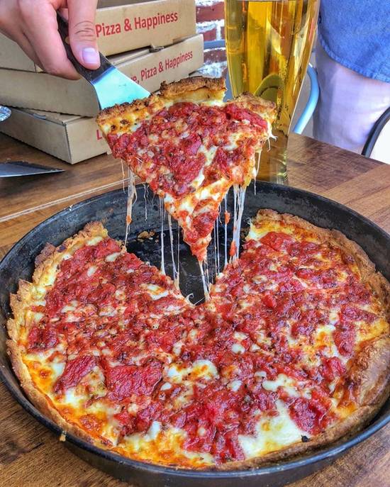 Order 9" Pan food online from Rance Chicago Pizza store, Costa Mesa on bringmethat.com