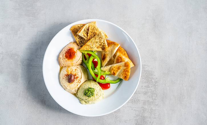 Order Hummus Trio food online from Zoe's Kitchen store, Dallas on bringmethat.com