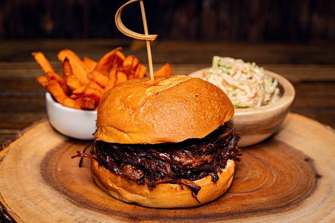 Order BBQ Pulled Brisket in a Bun food online from Holy Schnitzel store, Roseland on bringmethat.com
