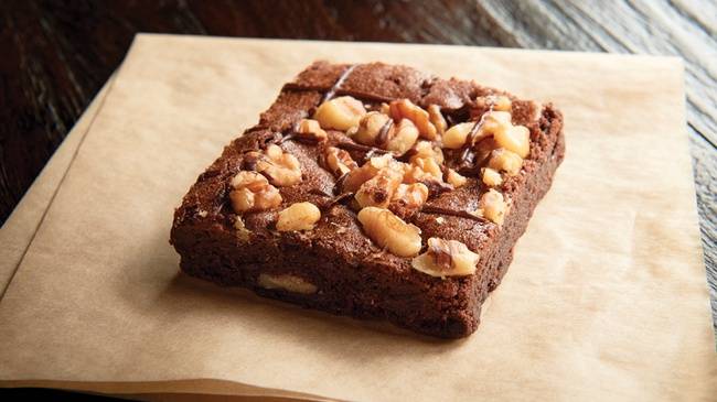 Order Fudge-Nut Brownie (450 cal) food online from Jason's Deli store, Amarillo on bringmethat.com