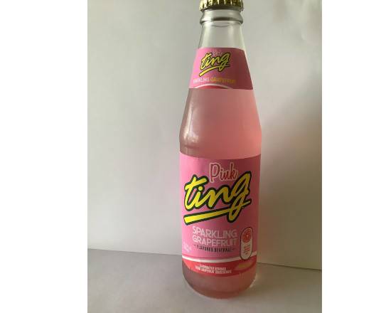 Order Ting Soda (Pink Bottle) food online from Carib Grill Caribbean Restaurant store, Upper Darby on bringmethat.com