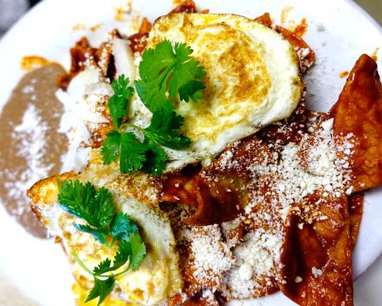 Order Chilaquiles: Red or green sauce - Please indicate your choice. food online from Azteca store, Dublin on bringmethat.com