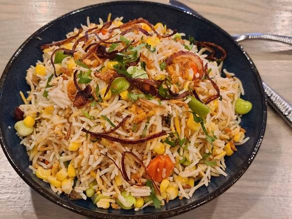 Order Spring Vegetable Pilaf (V) food online from Raag Indian Cuisine store, Minneapolis on bringmethat.com